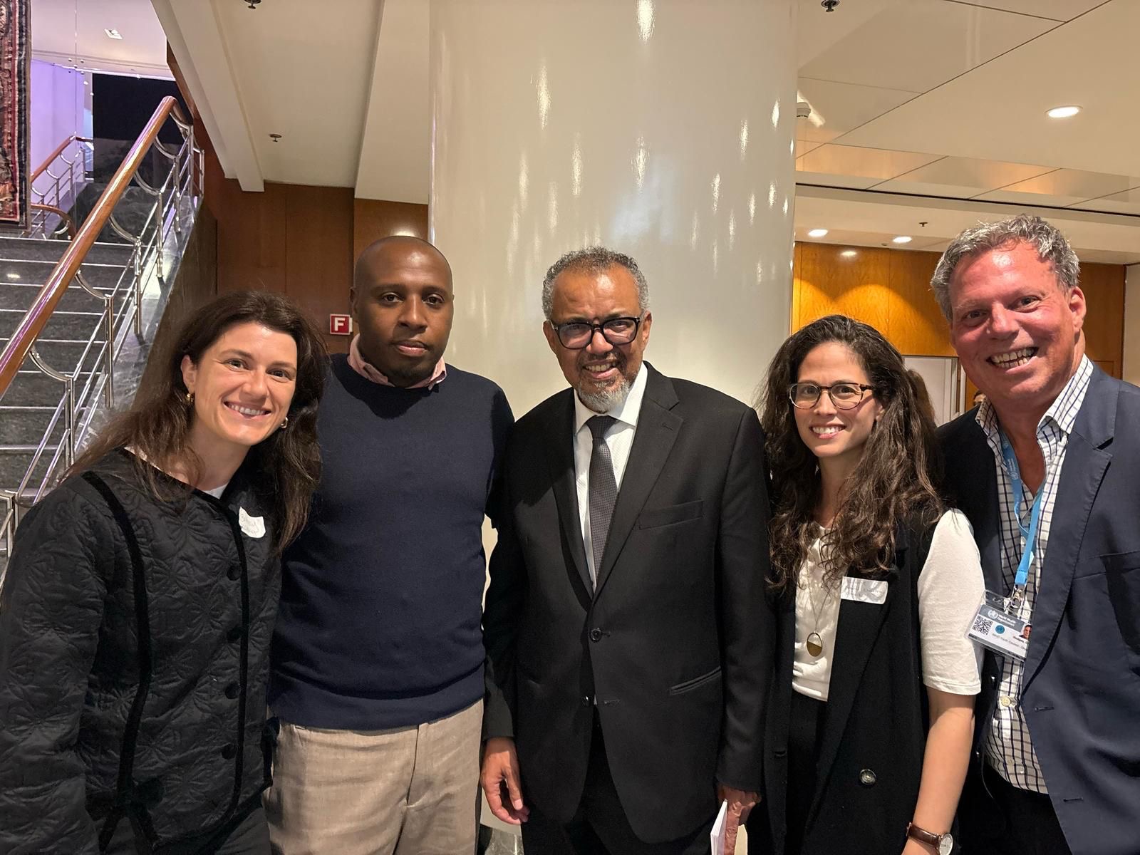 Craig-Hodges-with-WHO-Director-General-and-other-delegates.jpg