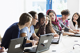 Photo of young people in class