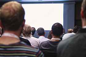 Photo of people in presentation
